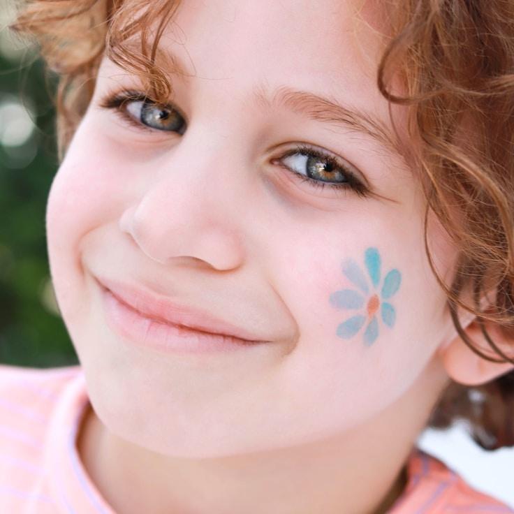 Avi Sharma, Lead Design Curator at Pencil Quil Link, reviewing corporate floral arrangements